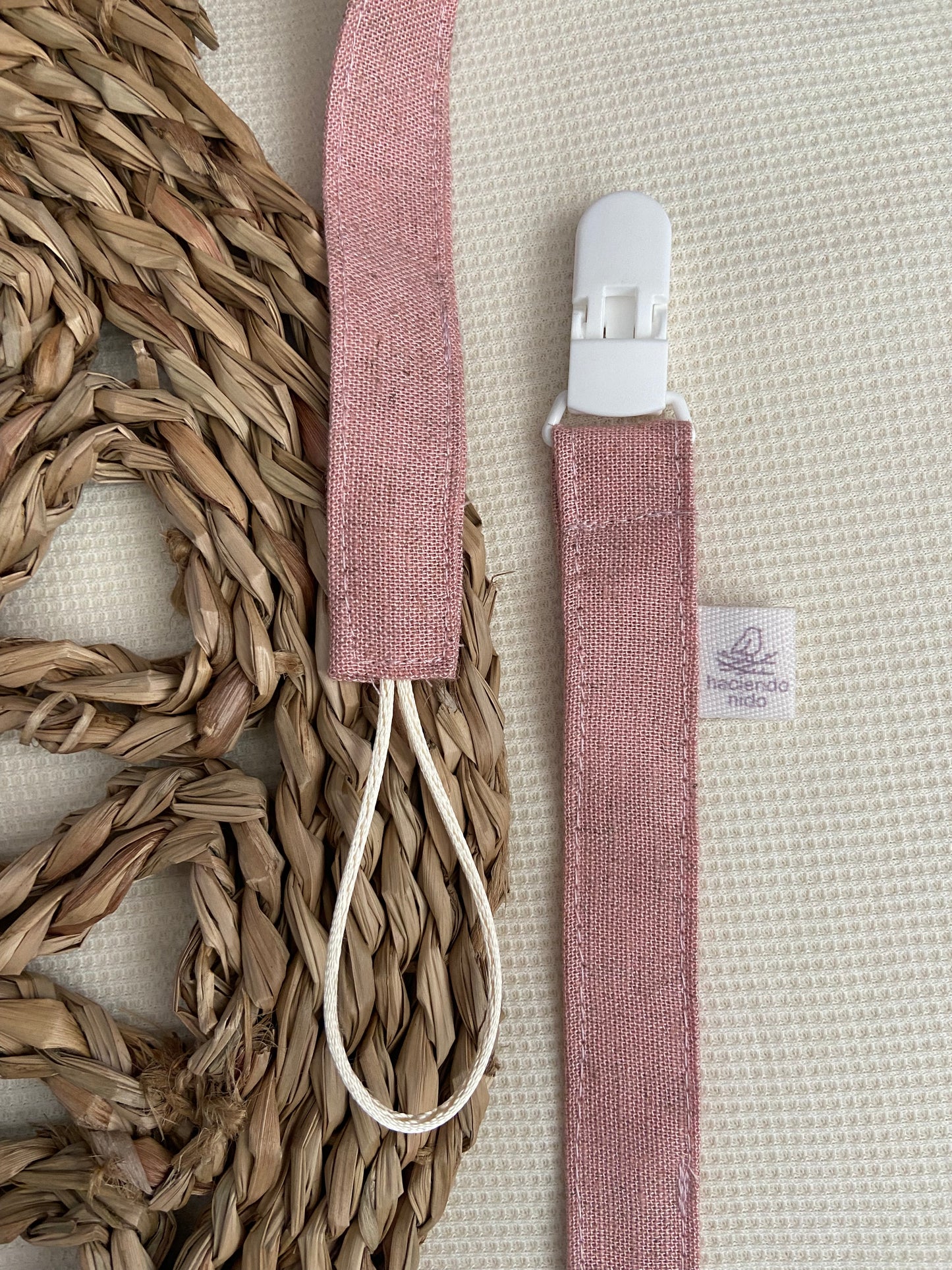 Porta chupete lino rosa