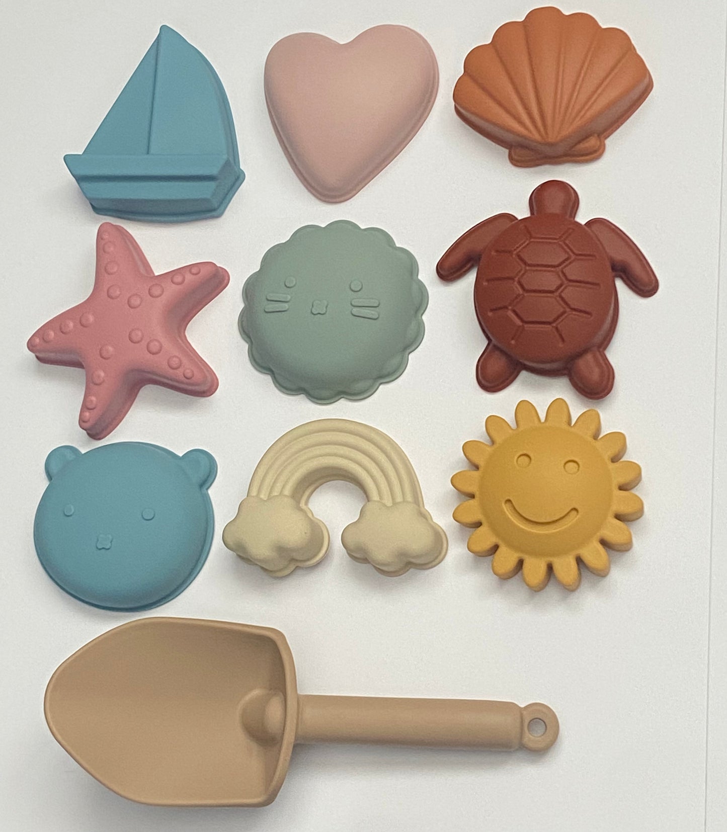 Juego de playa balde con figuras de colores